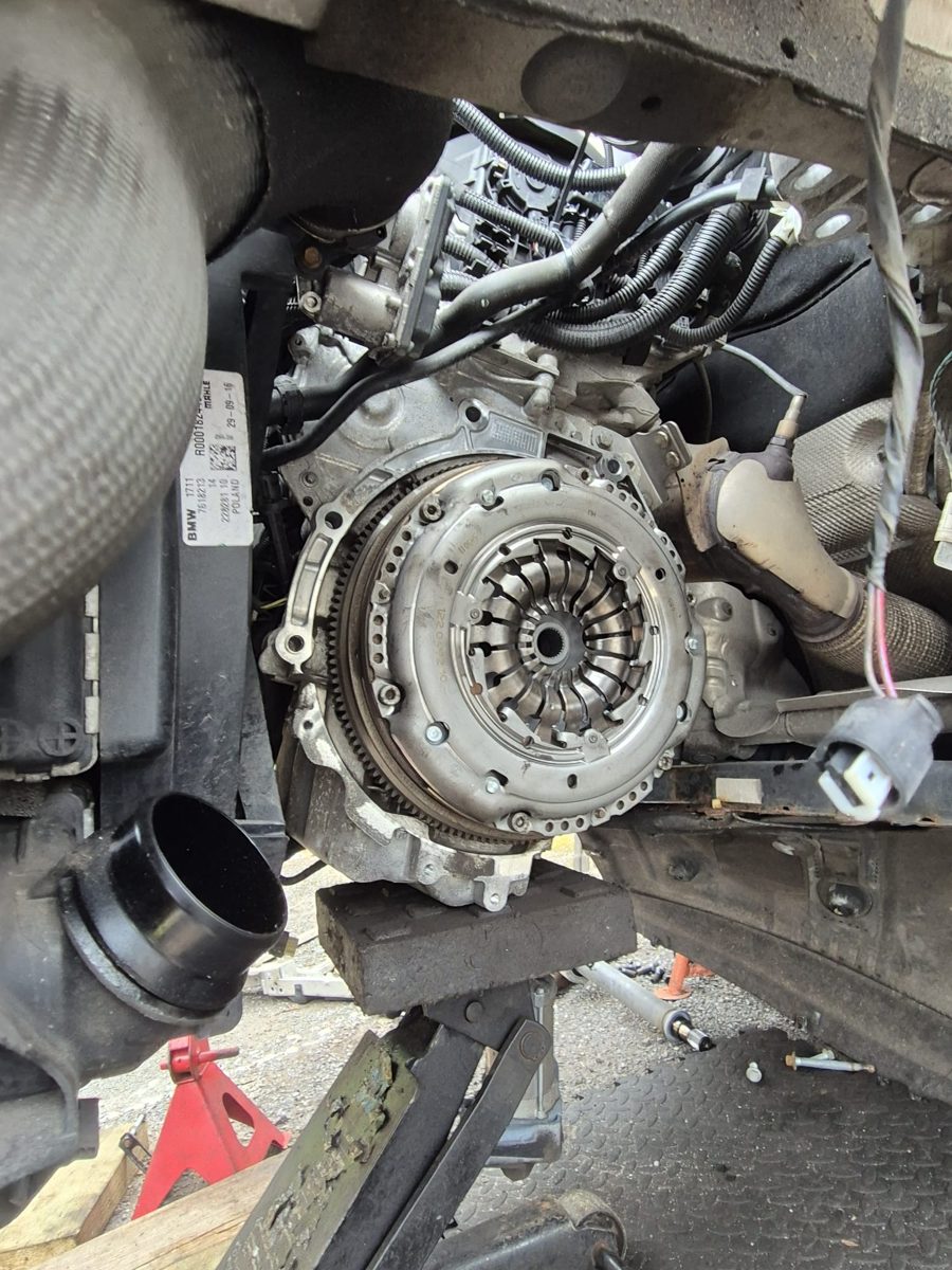 Close-up of fitted clutch assembly during mobile repair